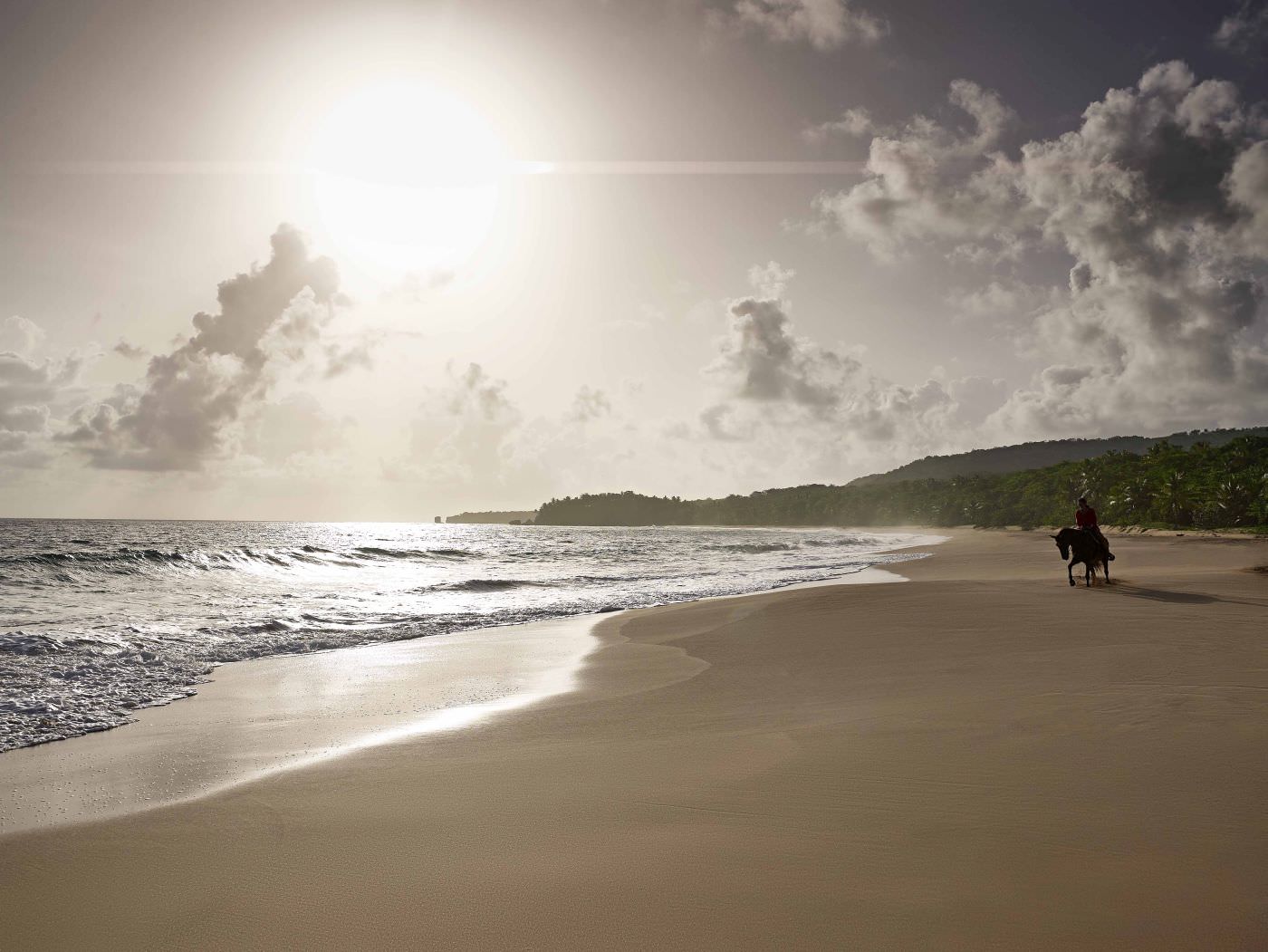 Reiten Sie in den Sonneuntergang