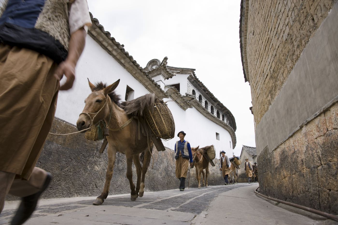 Fleißige Helfer in der Menschen Lijiangs