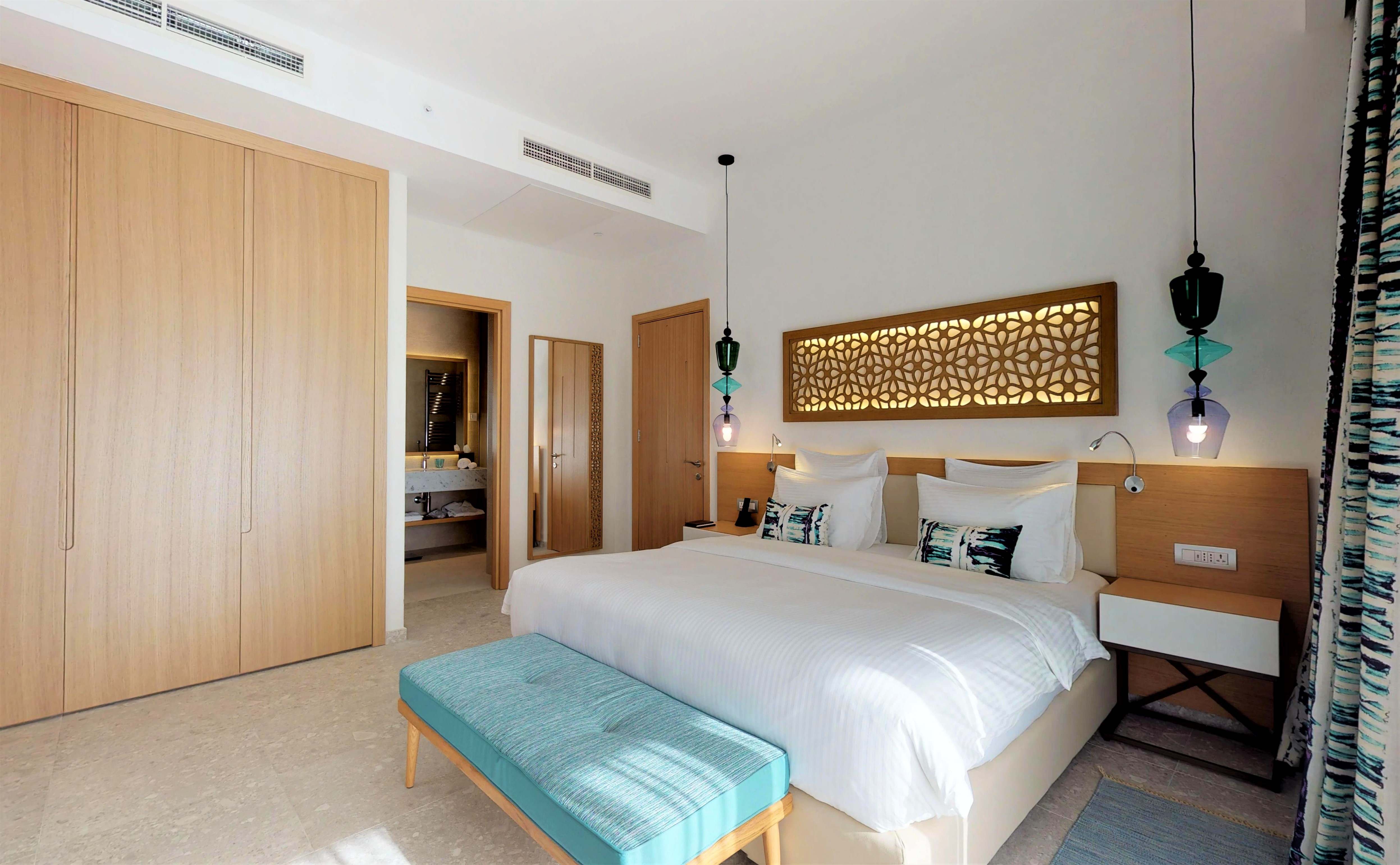  Das Schlafzimmer der Grand Deluxe Corner Suite