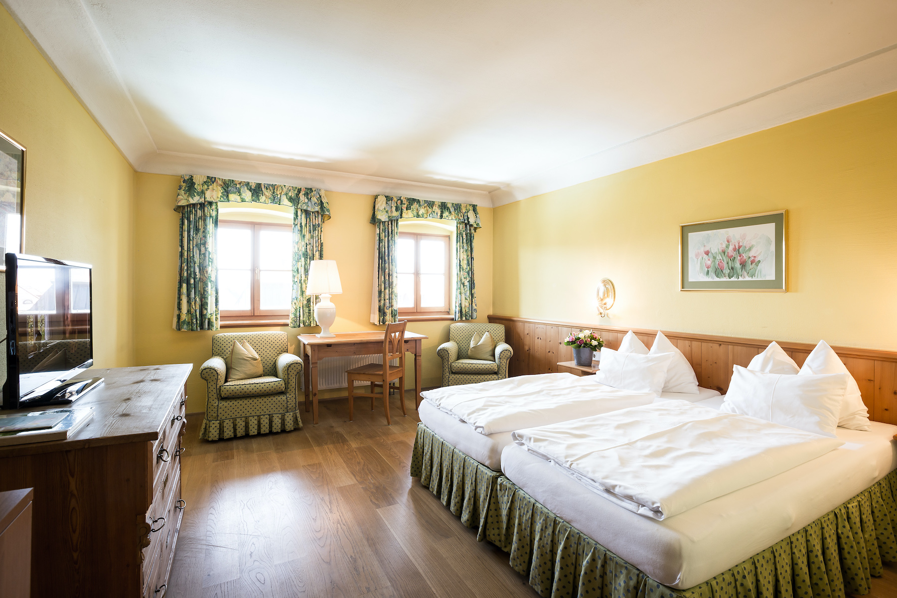 Der Landhausstil der Zimmer sorgt für eine traditionelle Atmosphäre